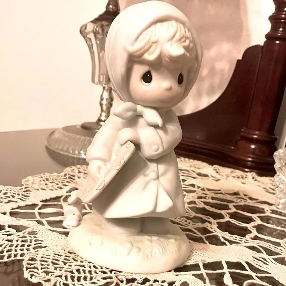 Vintage Precious Moments March Birthday Month figurine.